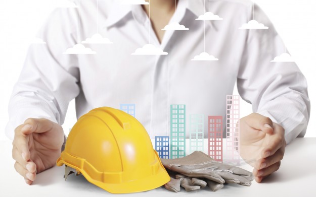 Building in  hand businessmen